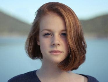 A portrait in front of a landscape shot in landscape orientation