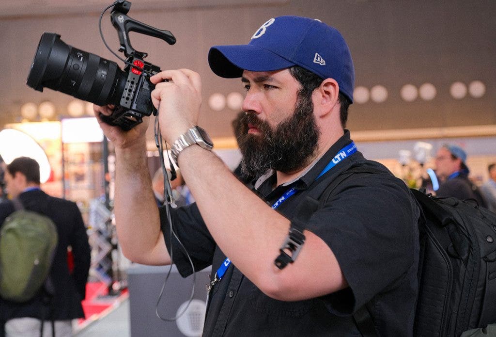 Photo of Fernando Martinez checking out his footage at the IBC2024 trade show by Cristina Santelises
