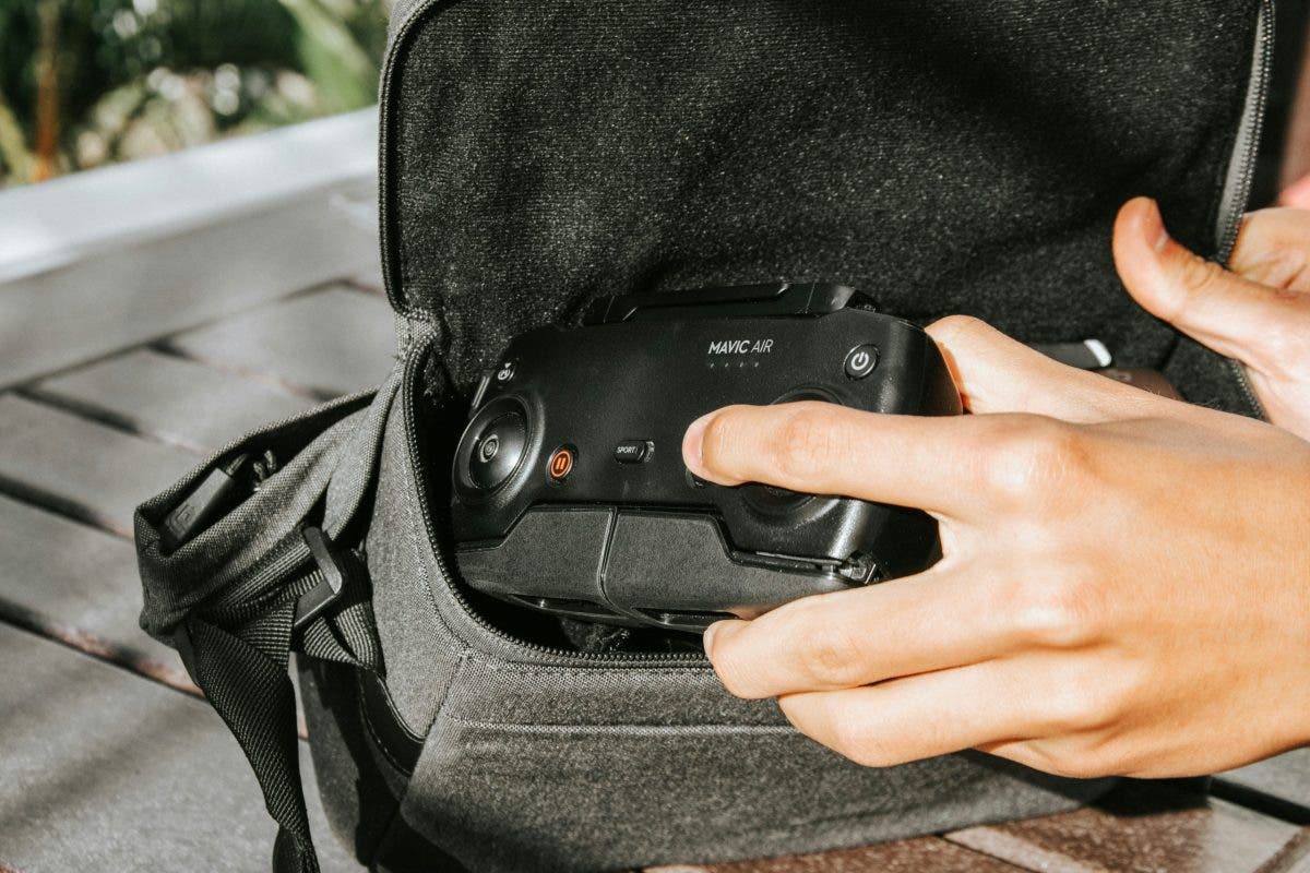 A drone user placing his drone in a drone case