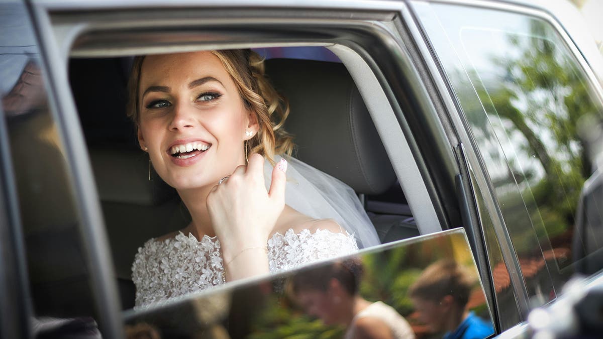 Bride in car