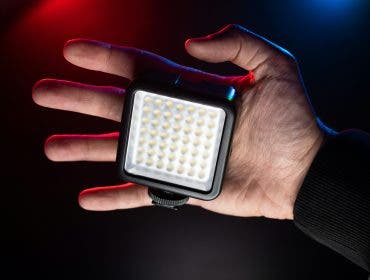 small video light on the palm of a videographer