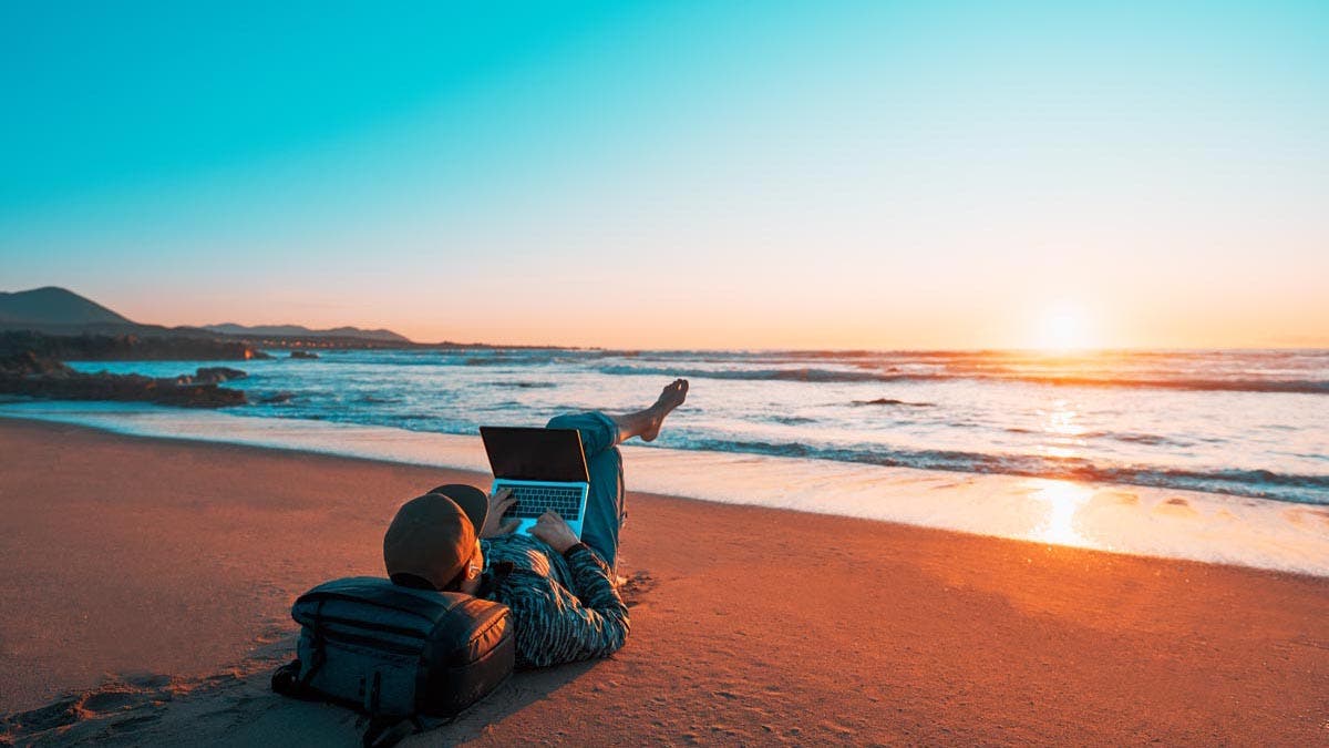 Laptop of digital Nomad on the beach