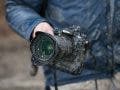 Nikon shooter in the field - Nikon covered with mud but still working