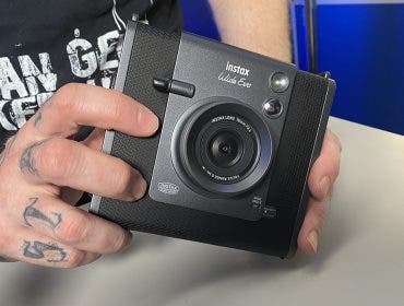 Seth holding the FUJIFILM Instax Wide Evo
