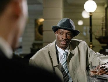 an over-the-shoulder shot example in a vintage themed film