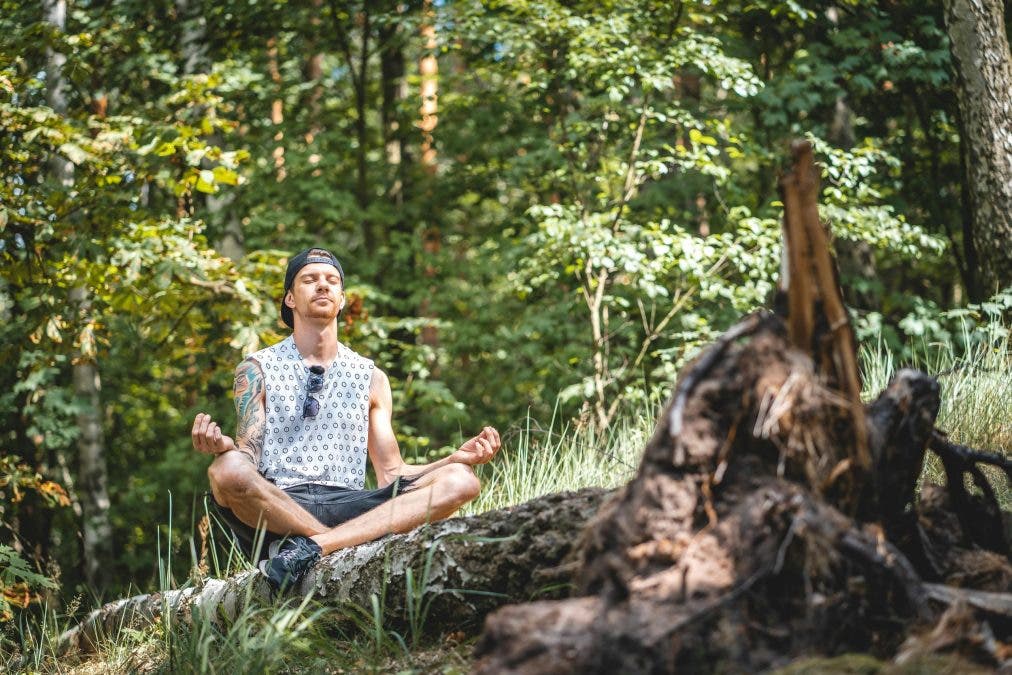 a man doing a list of self-care practices