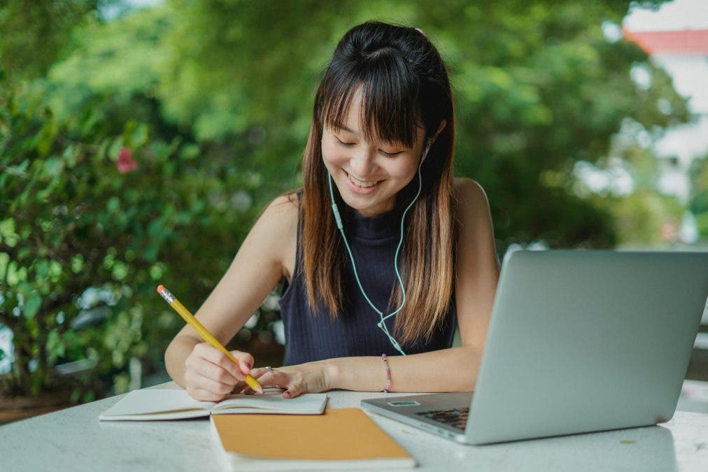 a girl thinking about how content writing helps digital marketing