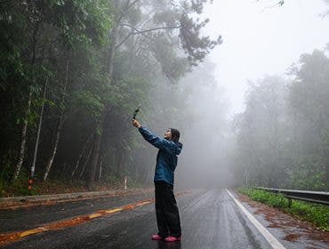 is vlogging dead? a vlogger in a beautiful forest