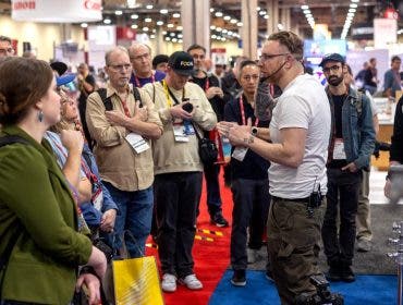 Seth speaks to the crowd at Imaging USA 2025