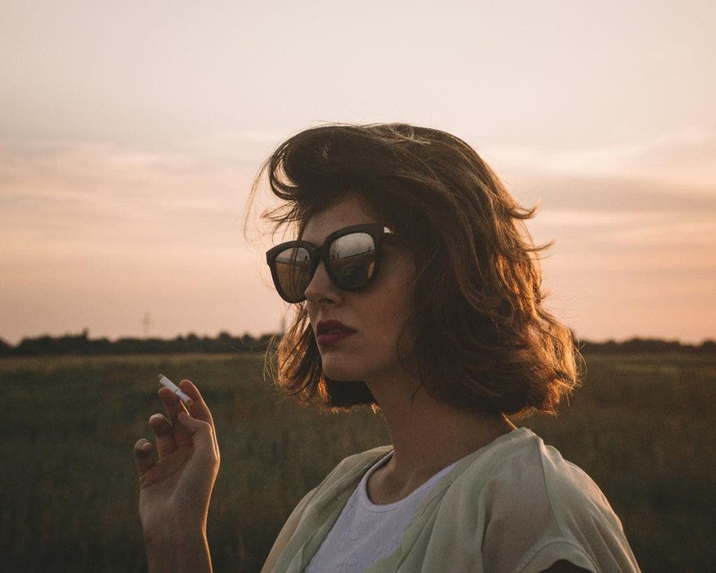 An example of how lenses in cinematography influence the shot - telephoto portrait