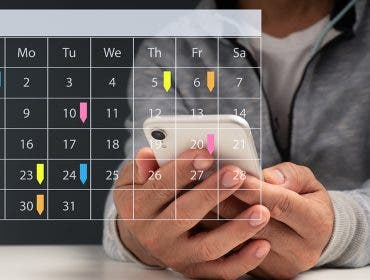 Appointment Reminder for the Calendar and the Organizer's Agenda.Event planners use timetables and agendas to arrange and schedule events.The man is on his phone, taking notes on his virtual calendar