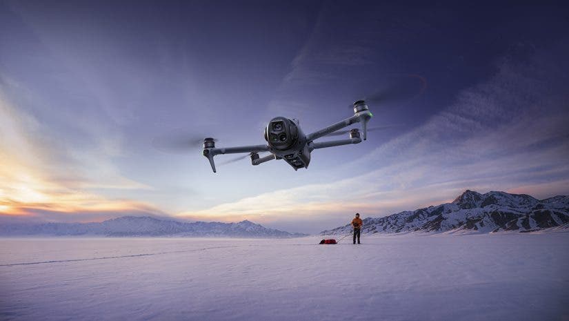 DJI Mavic 4 Pro flying over the snow