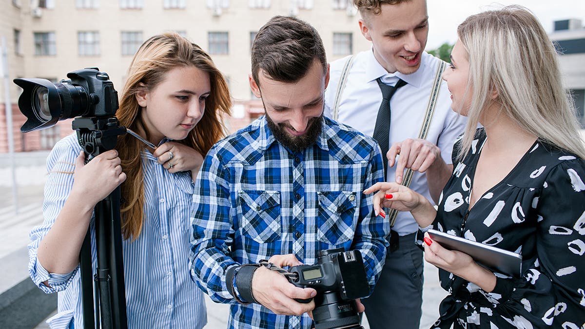 Photographers chatting and staying in the loop.jpeg