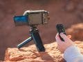 Sony GP-VPT3 hand of female subject camera on tripod using remote.- Photo by Austin Jame Jackson