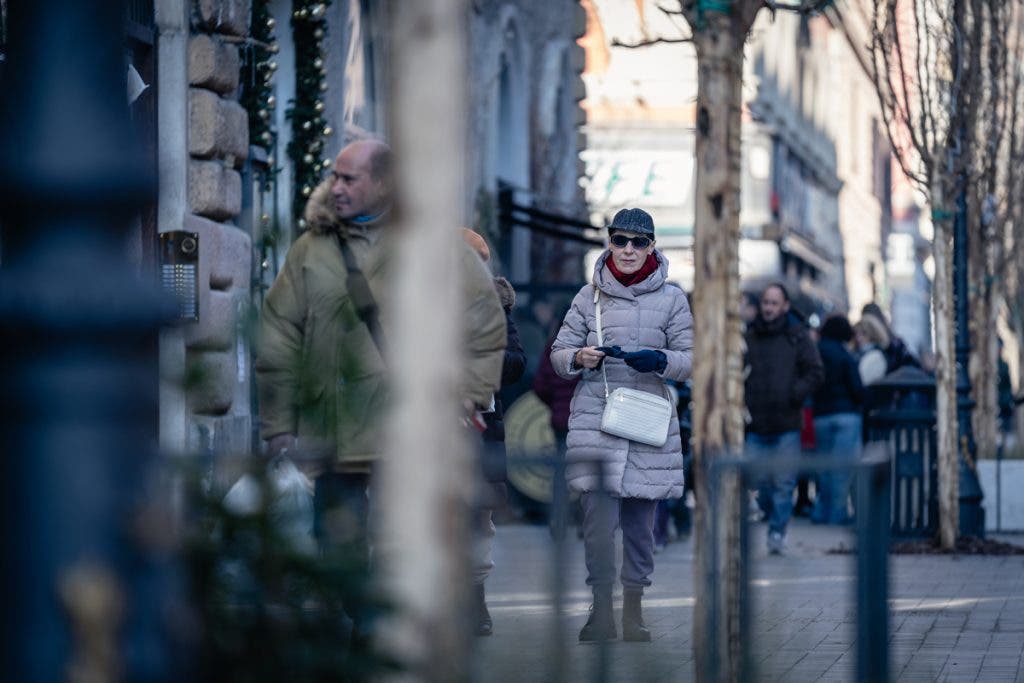 A Stylish Lady Walking in Rome