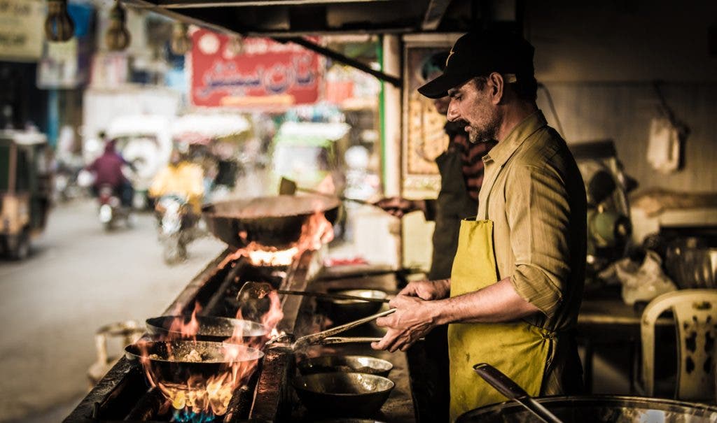 A man making Butter Chicken in Rawalpindi - Pakistan