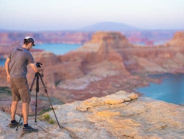 Our Photographer against a vast landscape