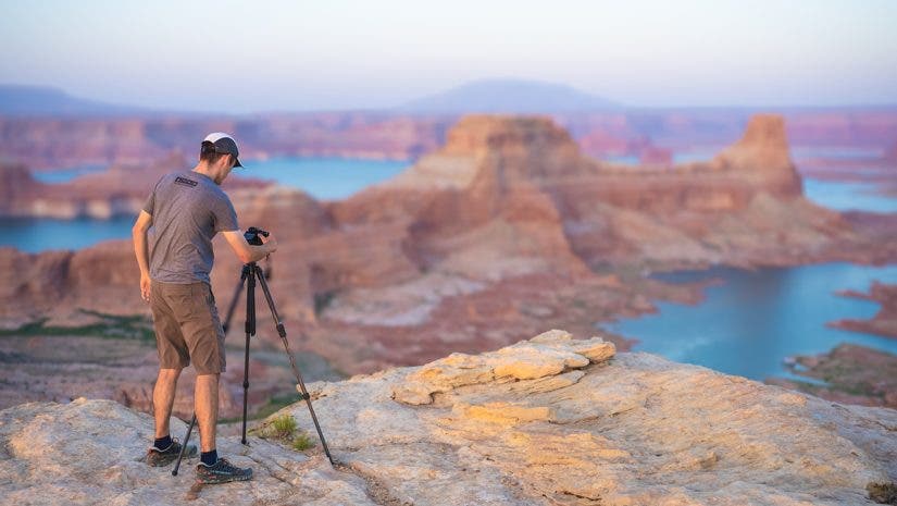 Our Photographer against a vast landscape
