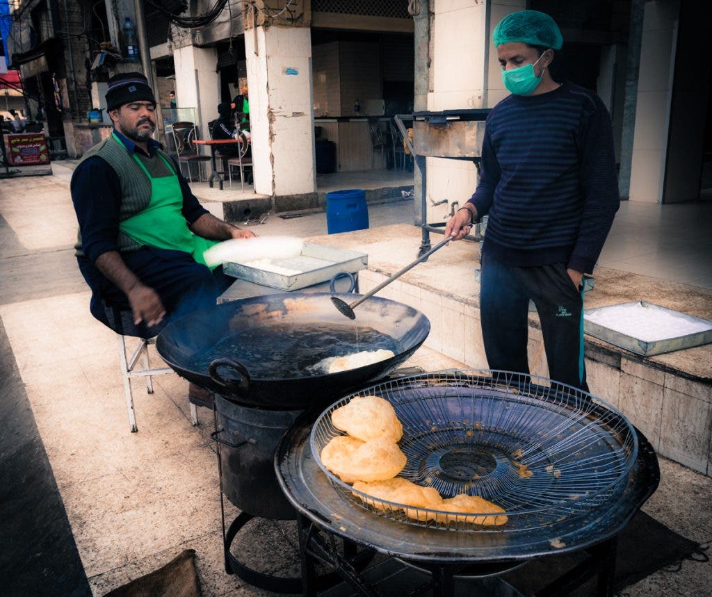 Men making Poori - Rawalpindi Pakistan