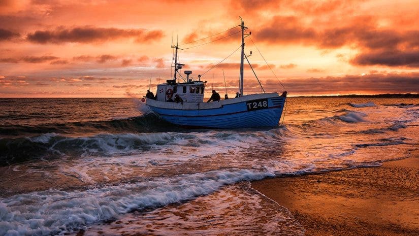 Thumbnail of fishing boat during golden hour