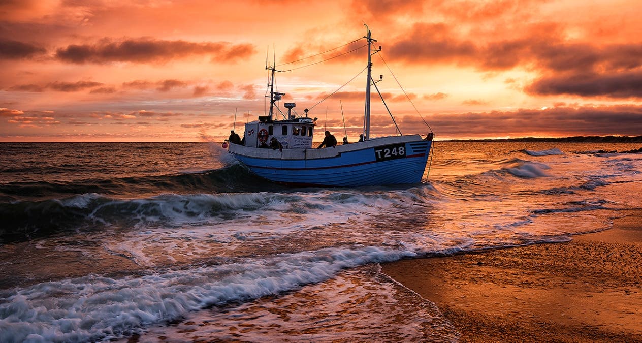 Thumbnail of fishing boat during golden hour