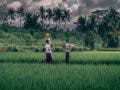 local people walking along a field
