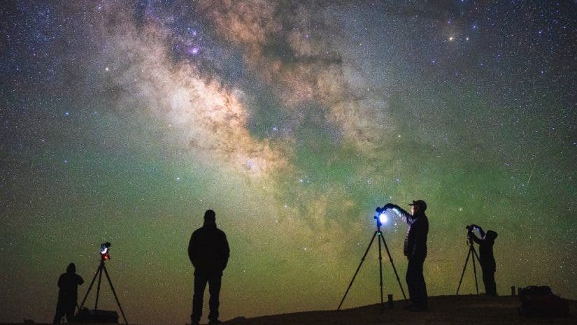 photography workshop conducted under a night sky with photographers and their tripods