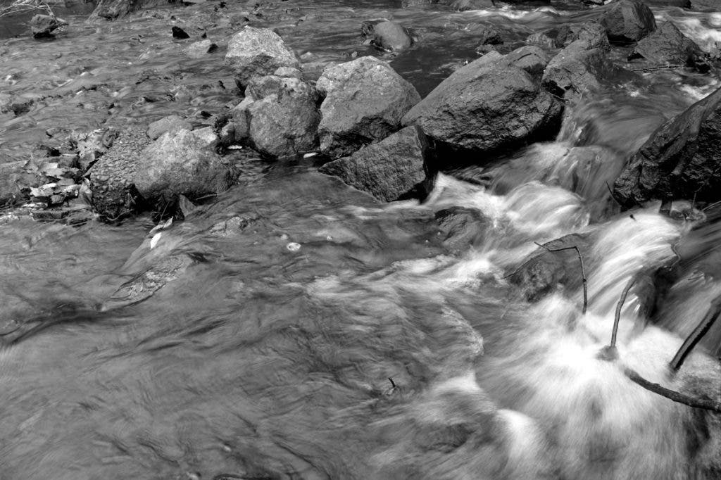 A slow shutter speed shot of a stream captured with the Leica Q3 Monochrom