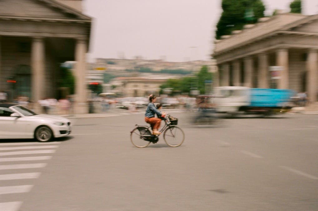 slow shutter shot of person on a bike