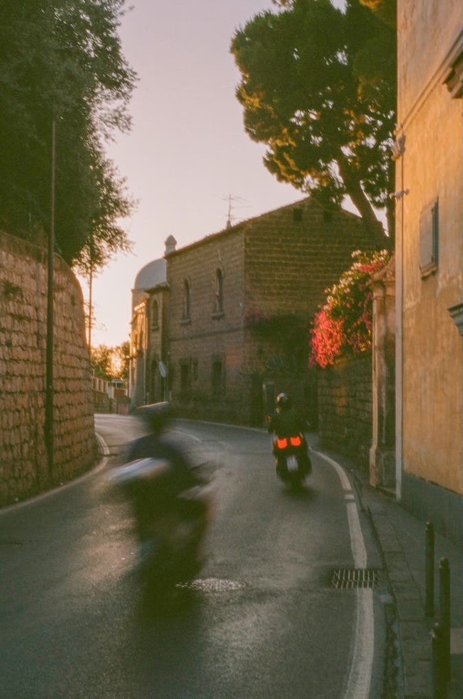 sorento photo of two motorcycles on a road