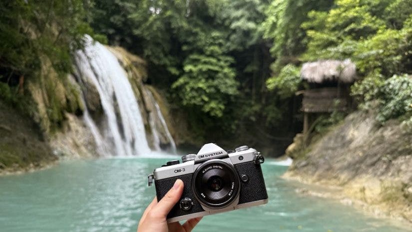 the OM System OM-3 in front of waterfalls