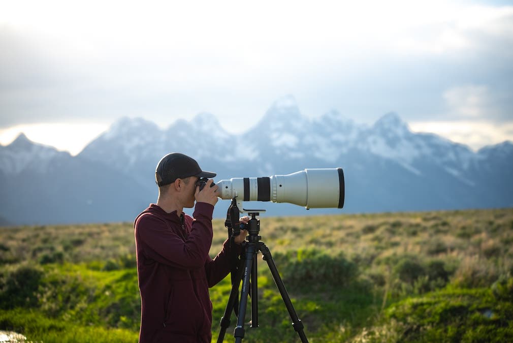 Using a tripod can allow you to extend the shutter speed without having to worry about the camera moving during the exposure, helping you to maintain a sharp image with minimal noise.