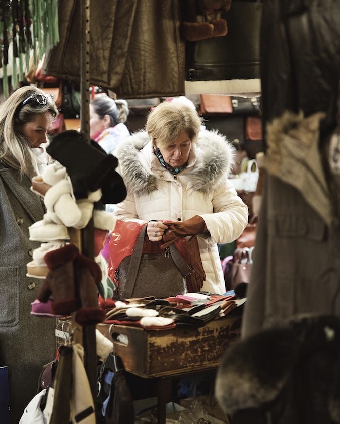 a lady in a fur coat in Florence Italy