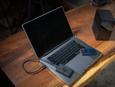 laptop with storage devices on top
