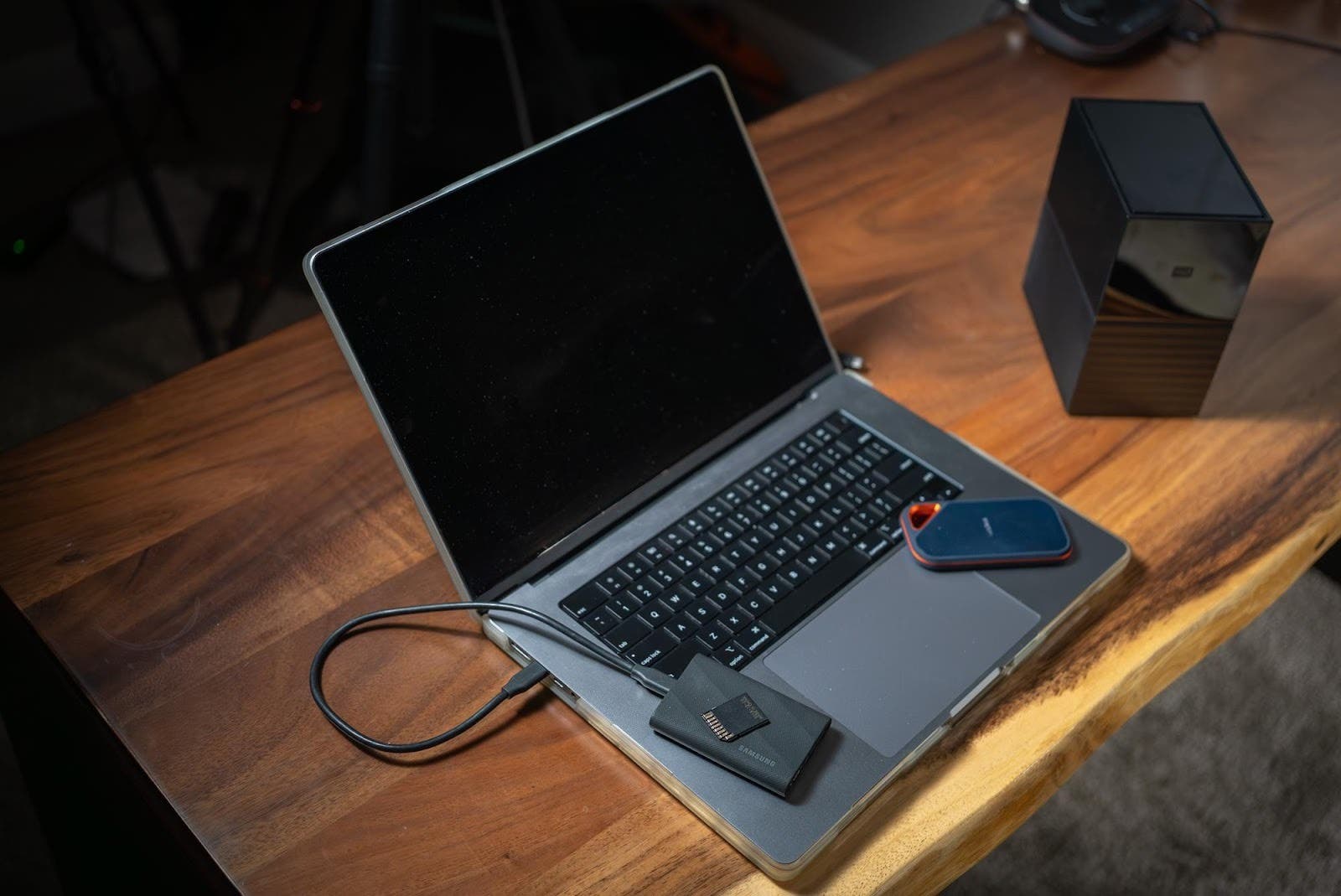 laptop with storage devices on top