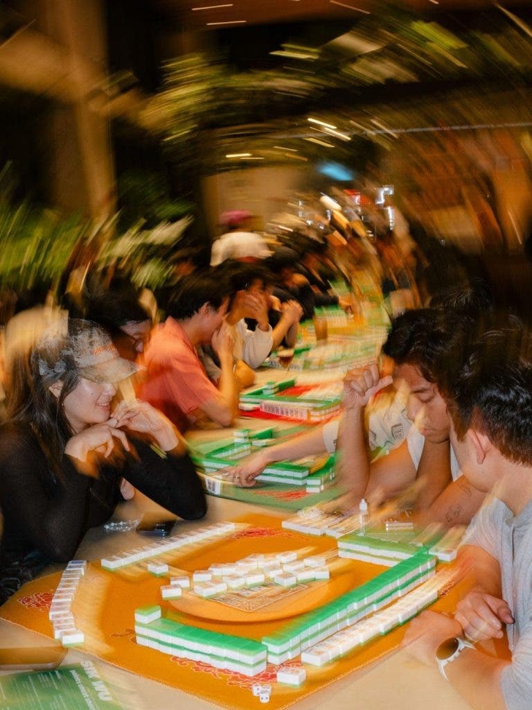 people playing board game
