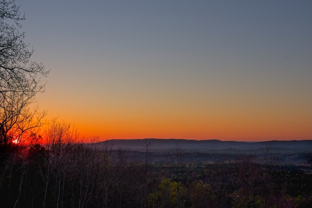 Panoramic sunset photograph of a scenic overlook scouted for night photography