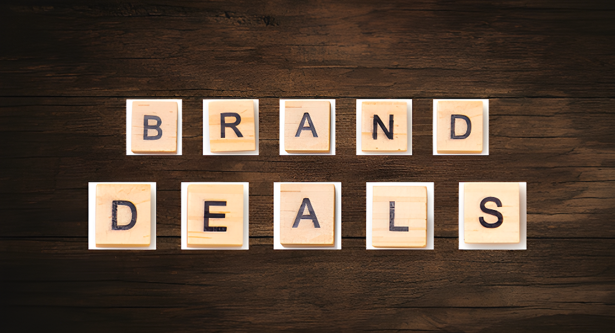 "brand deals" spelled out in wooden characters