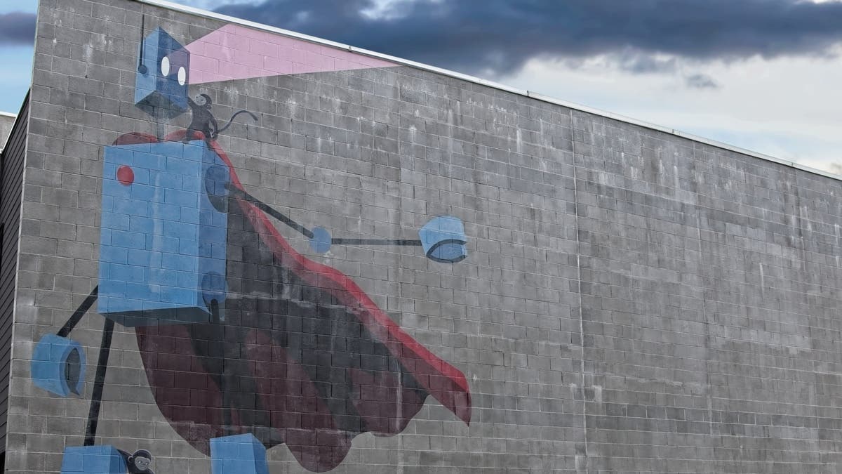 John Lytle Wilson’s aging robot with monkeys mural in Birmingham, Alabama, is a good metaphor for how AI was once seen as a hero and now has a fading reputation