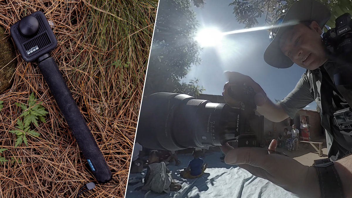 A split-screen image. The left side shows a black GoPro 360 camera attached to a textured black grip, resting on a bed of dry pine needles. The right side shows a low-angle perspective of a photographer wearing a wide-brimmed hat, holding a Sony camera with a large lens. The sun flares brightly behind him, and a group of people can be seen sitting on the ground in the background.
