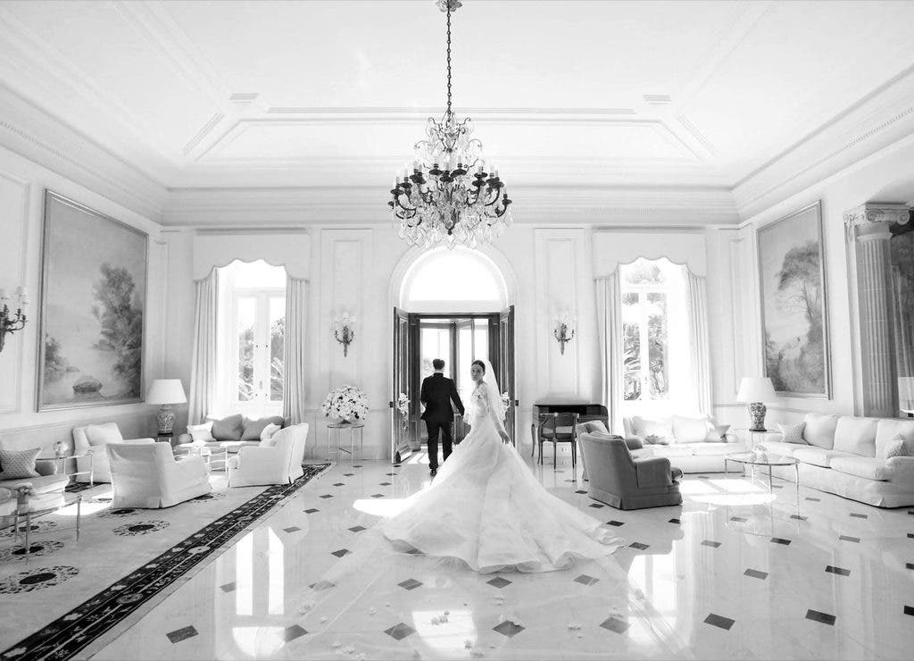 Photo by Elizabeth Messina wedding couple heading out a hotel door, no doorman.