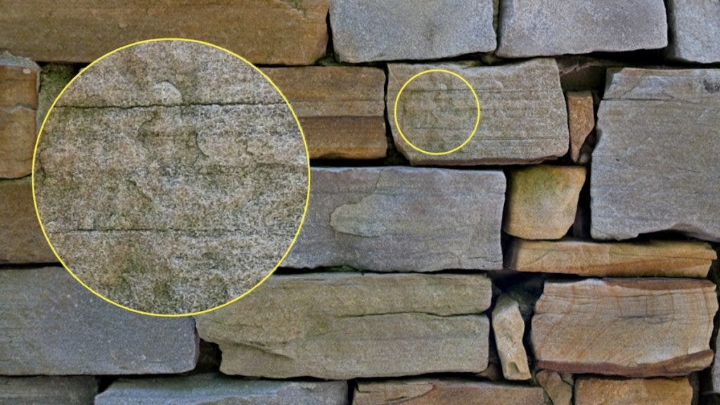 Photo of stacked stonework with highlight texture detail showing focus shot on LUMIX G9II