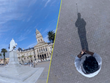 Primary Alt Text Split-screen view showing a wide-angle city plaza and a top-down perspective of a photographer using a 360 camera on a selfie stick