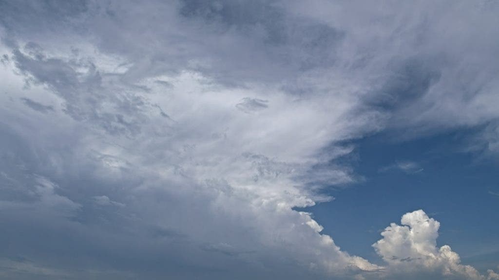 Photo of building storm clouds showing nuanced dynamic range from the LUMIX G9II