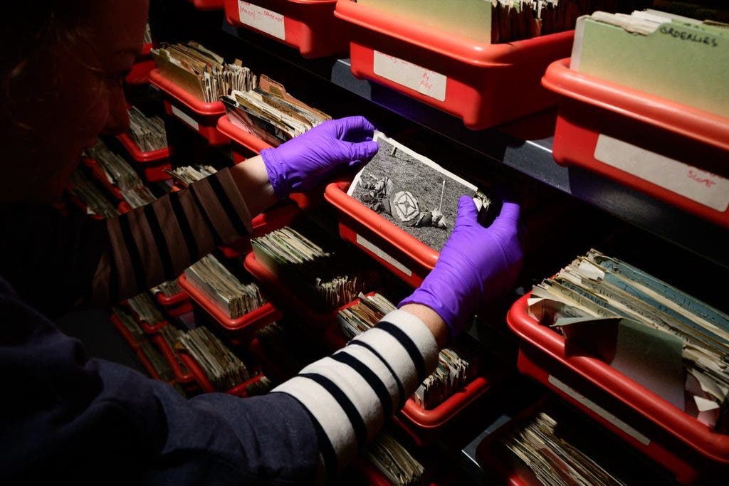 Curatorial Assistant Poppy Pollitt working with the index prints of the Keystone collection at the Getty Images Hulton Archive, London, E16, 21st September 2023. (Photo by Leon Neal/Getty Images)