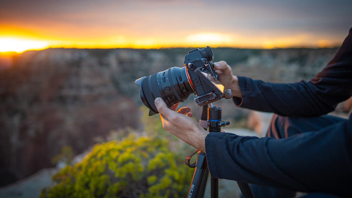 Photographer shooting in full manual mode