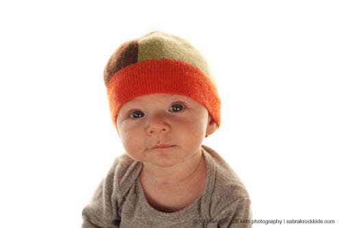 Baby wearing a bonnet 