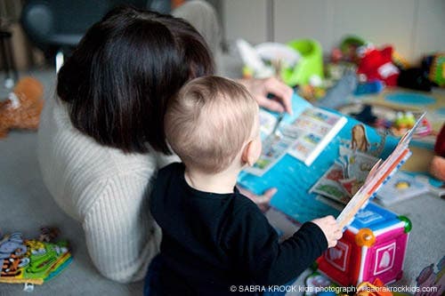 Aunt and baby reading