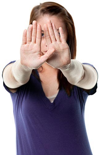 Woman with stop hands