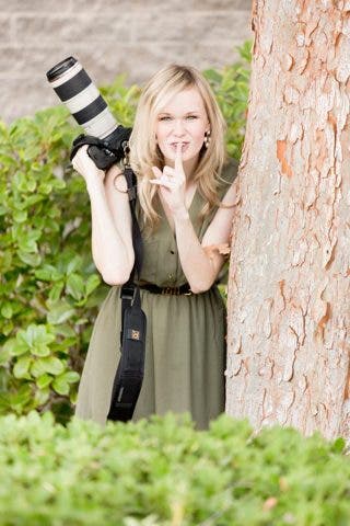 Photographer behind a tree